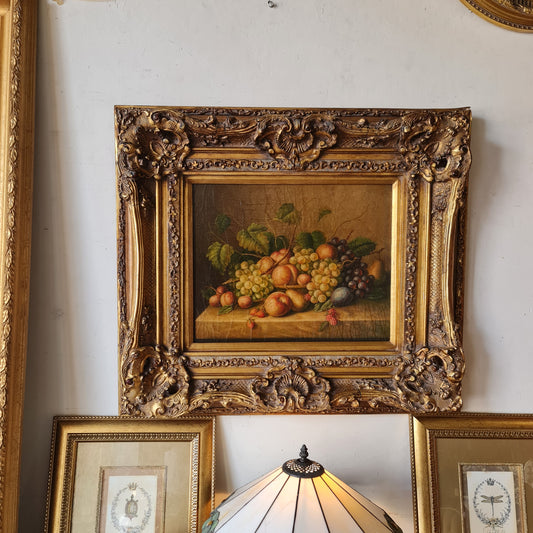 Gilt Framed Picture in the Antique Style with a Carved Frame