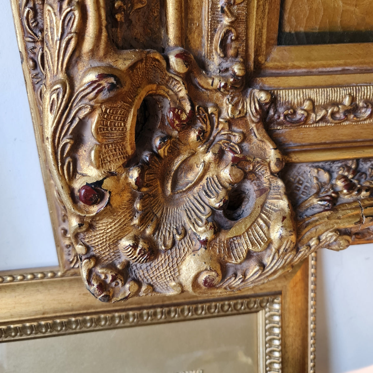 Gilt Framed Picture in the Antique Style with a Carved Frame