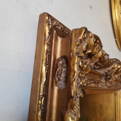 Gilt Framed Picture in the Antique Style with a Carved Frame