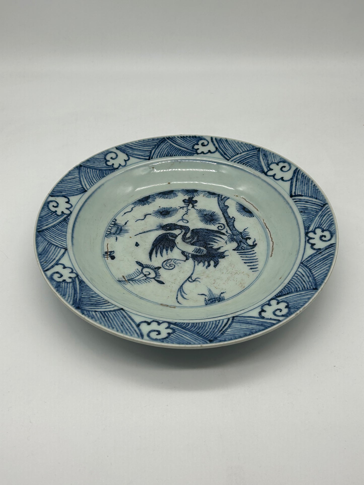 Blue and White Decorative Plate with Bird Motif – Unmarked