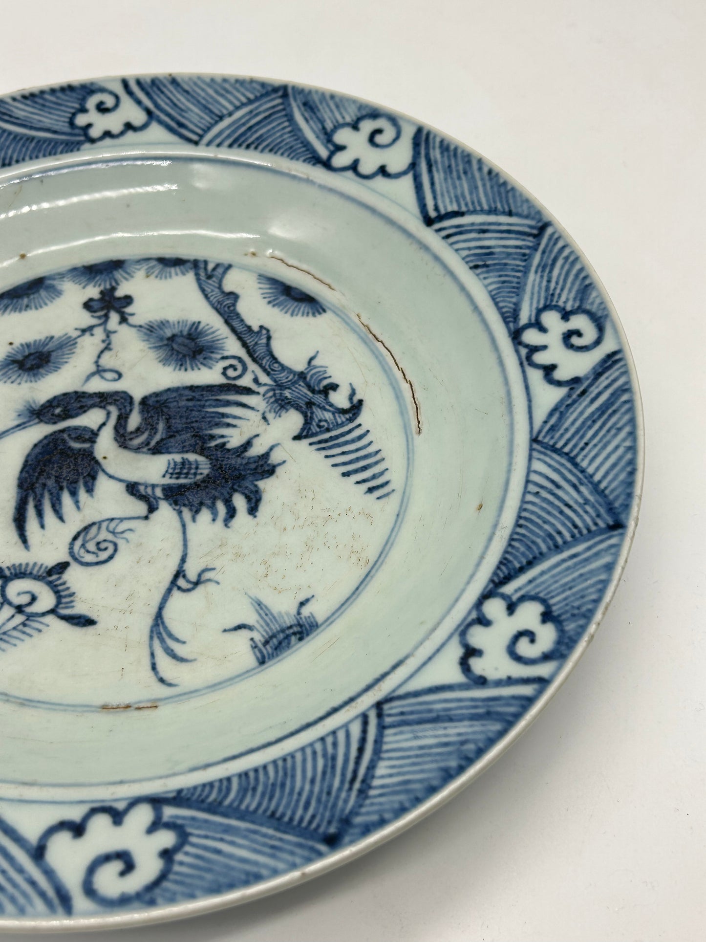 Blue and White Decorative Plate with Bird Motif – Unmarked