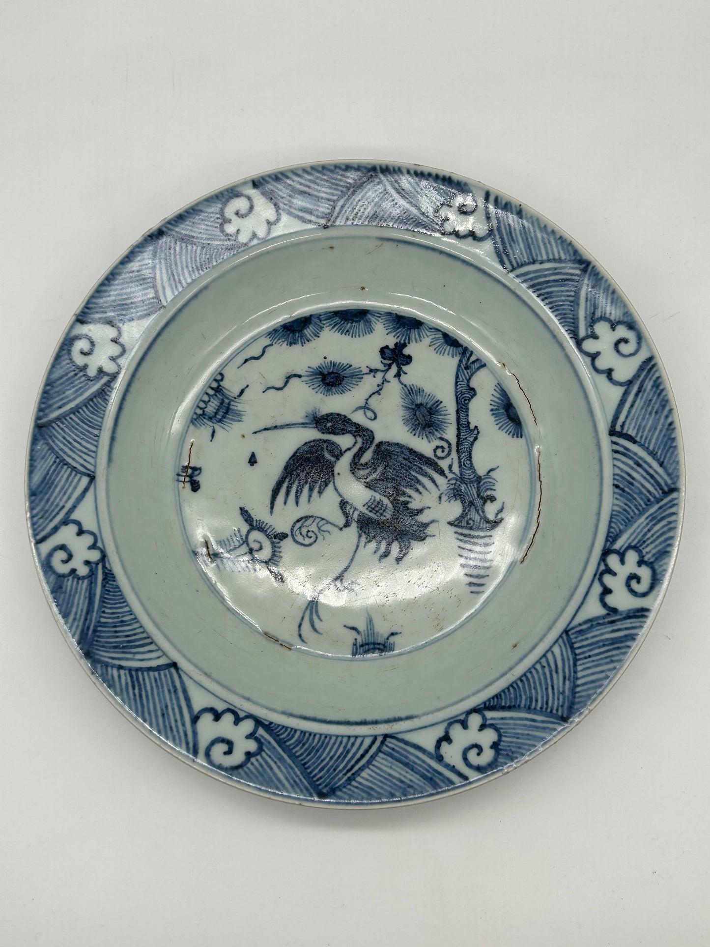 Blue and White Decorative Plate with Bird Motif – Unmarked