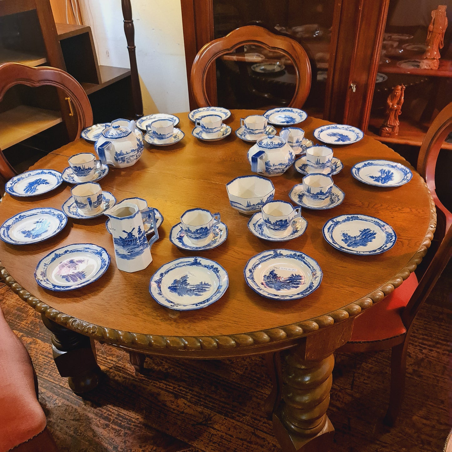 Antique Round Oak Extension Table in The Jacobean Revival Style